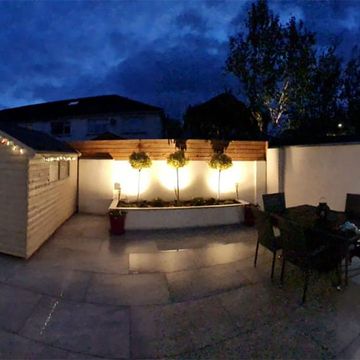 Paving,lighting and flowerbed done in firhouse