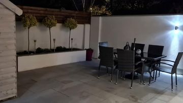 Paving,lighting and flowerbed done in firhouse